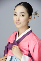 young woman in korean traditional clothing, hanbok
