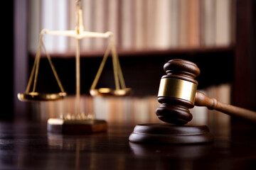 Judge‘s gavel on bookshelf background. Judge office.