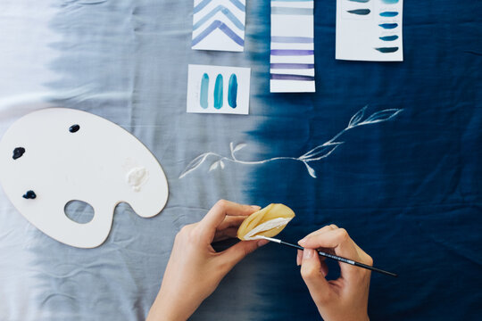 Female Artist Making Textile Print with Potato Stamps
