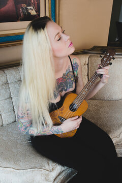Musician practicing ukelele