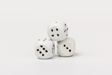 White gamble dice with black dots, isolated on white background.