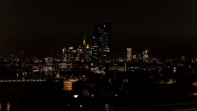 Cityscape illuminated at night, Frankfurt, Hesse, Germany