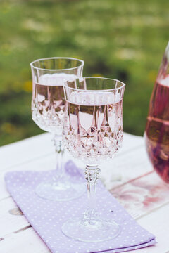 Pitcher and glasses on a little table in the garden