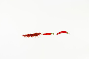 red chilli and red chilli powder with white background.