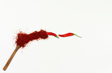 red chilli and red chilli powder with white background.