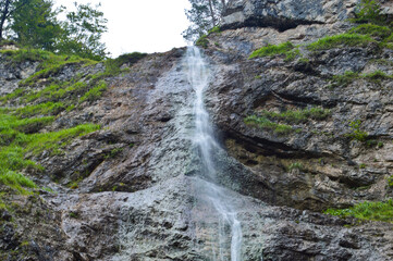 Beautiful rocky Nixenfall during summer in salzkammergut near Attersee in Austria
