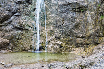 Beautiful rocky Nixenfall during summer in salzkammergut near Attersee in Austria