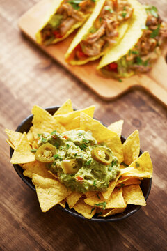 Tortilla chips with guacamole sauce