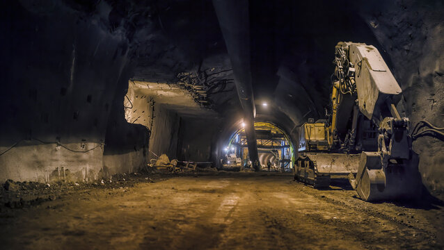 entrance to the tunnel, bulldozer, workers