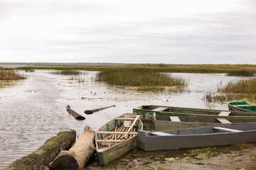 an old boat on the lake