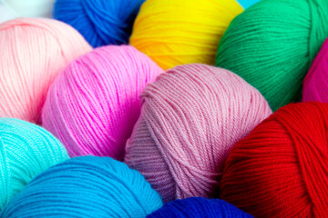 Bright multi-colored acrylic yarn. Colorful background.