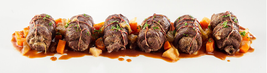 Panorama banner with row of beef roulades