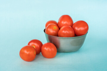 Group of fresh tomato on blue background