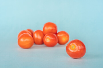Group of fresh tomato on blue background
