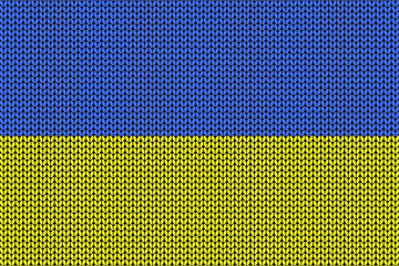 Ukraine flag in knitting background for the winter season
