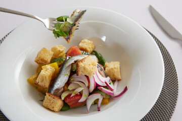 Delicious fresh caesar salad, with anchovies. Shallow dof