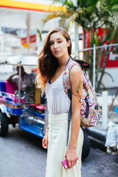 Beautiful woman walking in the city