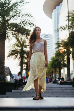Beautiful woman walking in the city