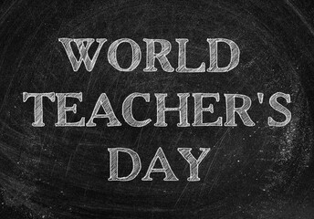Fototapeta na wymiar Text Happy Teacher's Day on blackboard. Greeting card design