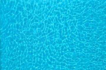 Pure water with ripples in swimming pool