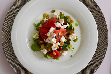 Greek vegetable salad with feta cheese. Shallow Dof.