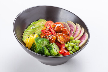 Organic food. Tuna poke bowl with crystal noodles, fresh red cabbadge, avocado, cherry tomatoes. Food concept poke bowl on white background, Top view, Closeup.