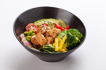 Organic food. Tuna poke bowl with crystal noodles, fresh red cabbadge, avocado, cherry tomatoes. Food concept poke bowl on white background, Top view, Closeup.