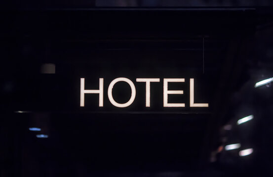 Hotel neon sign in a dark part of the city