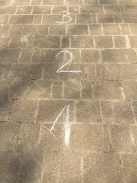1, 2, 3 chalk marks by kids