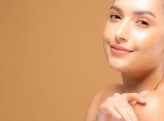 Beautiful woman with good skin taking pictures of face with hands, beautiful portrait and spa. Happy smiling face