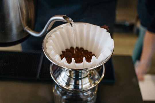 making a pour over coffee at cafe
