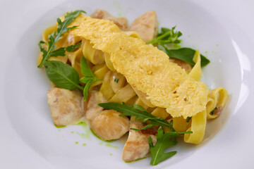 Tagliatelle with Mushroom, Cream Sauce, Truffle and Arugula