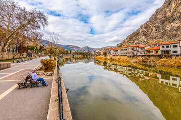 Old Ottoman houses view by the Yesilirmak River in Amasya City. Amasya is popular tourist destination in Turkey. 