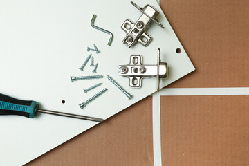 spare parts for furniture assembly top view. furniture fittings background. 