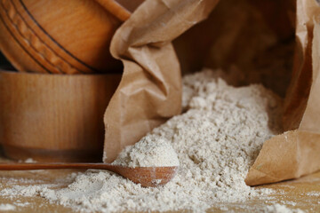 Almond flour pile top view isolated on brown background