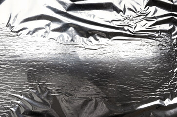 silver texture of crumpled sheet of foil, full frame, element for designer