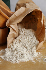 Almond flour pile from top on wooden background