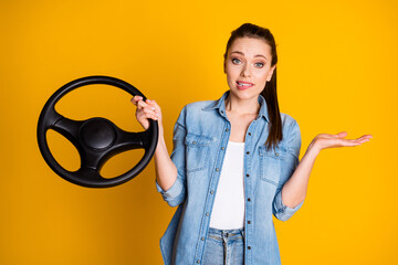 Photo of frustrated girl drive car hold steering wheel shrug shoulders bite lips teeth have no...