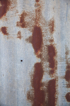 close up on old tin and wooden shed