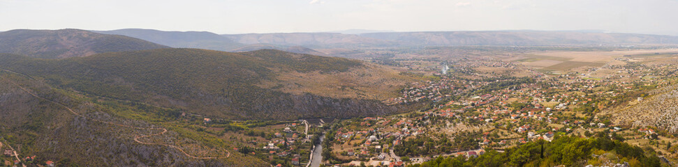 Fototapeta na wymiar Panoramic view of the valley in which the town of Blagaj is located. Bosnia and Herzegovina