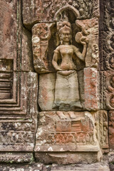 Stone bas relief carvings of a devata deity at Ta Som,  Angkor, Siem Reap Cambodia