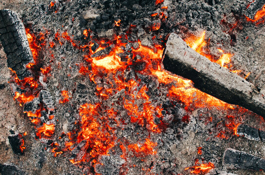 close up of a campfire in a pit