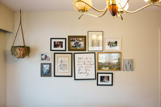 Cool Collage of picture frames with family photos and art