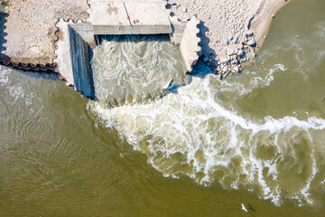 Discharge of sewage into the river, ecological disaster after failure of the sewage treatment plant, Warsaw, Poland