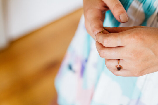 young woman holding hands together