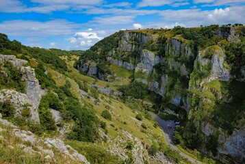 Cliffs of Cheddar Gorge from high viewpoint. High limestone cliffs in canyon in Mendip Hills in Somerset, England