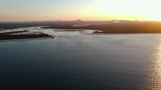 Beautiful sunset over the Sunshine Coast - Noosa National Park - QLD Queensland Australia - Aerial