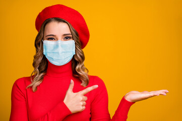 Close-up portrait of her she attractive healthy girl wearing gauze safety mask demonstrating copy space stop influenza infection mers cov isolated bright vivid shine vibrant yellow color background