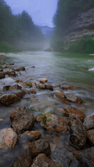 alpine river with the mist 
