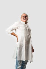 Indian senior or old man having ache or body pain, sad expressions